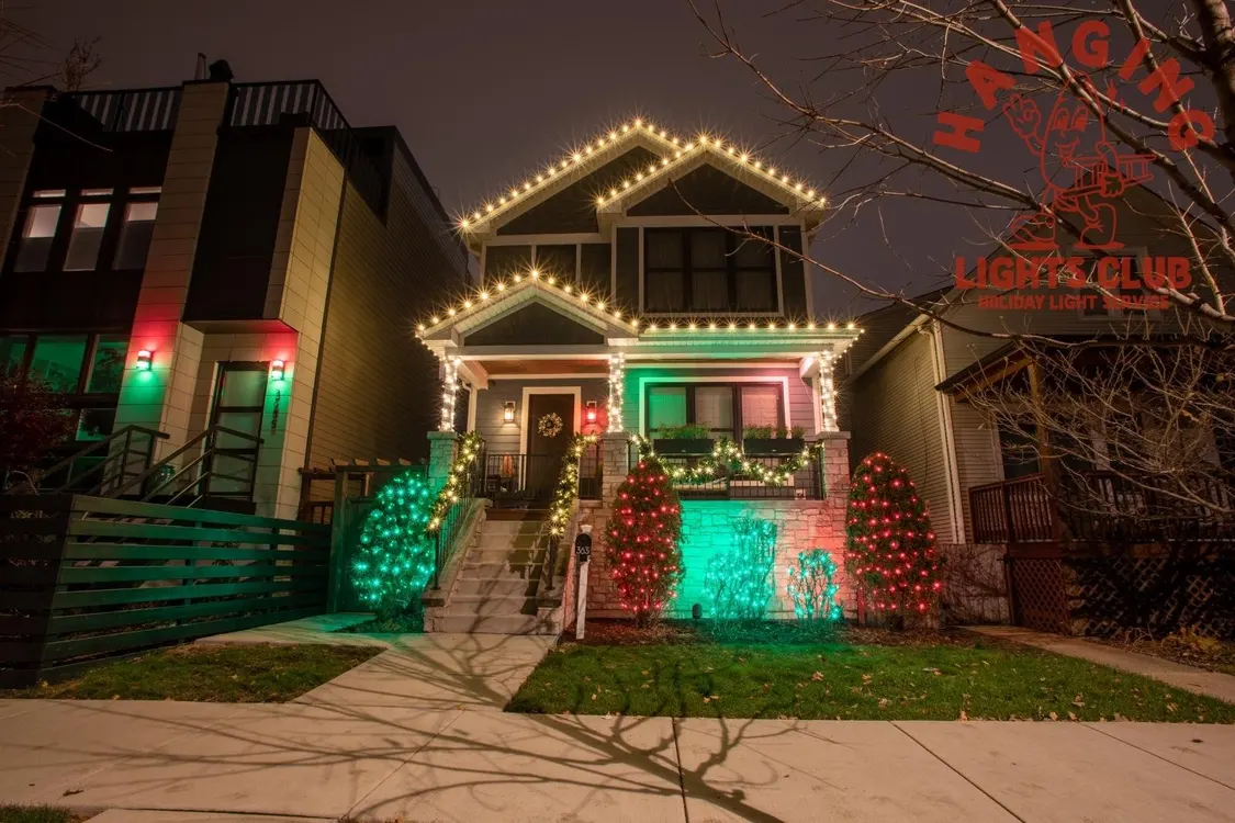 Large commercial building with an elaborate holiday light display
