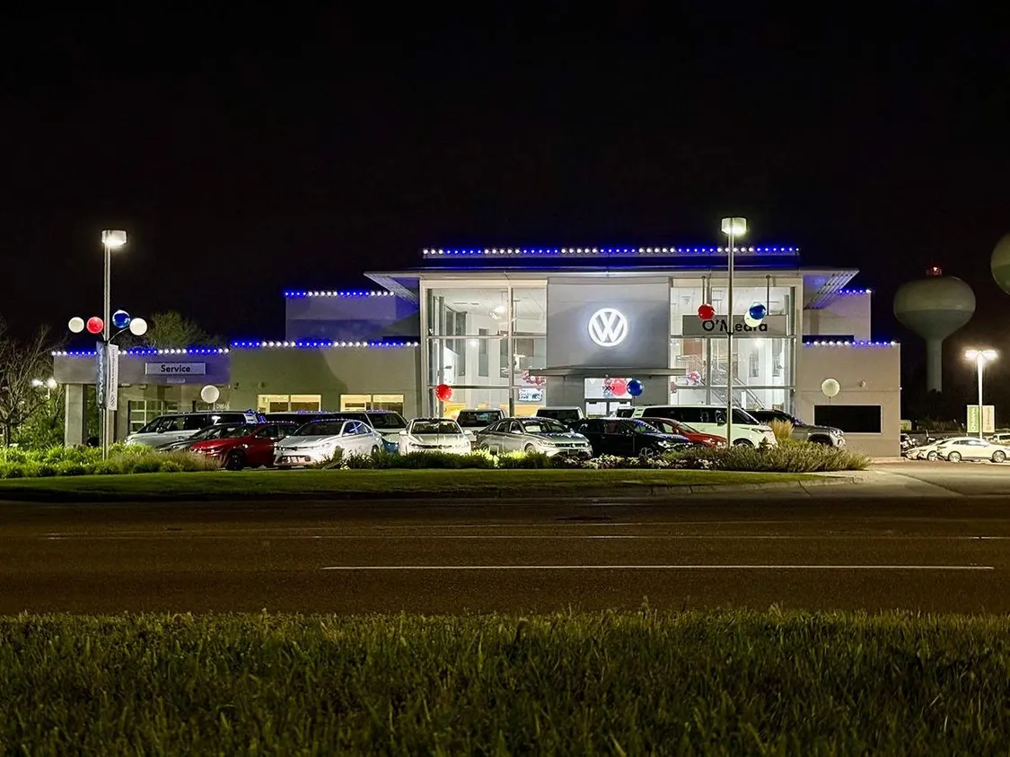 Volkswagen dealership with blue and white LED strip lighting