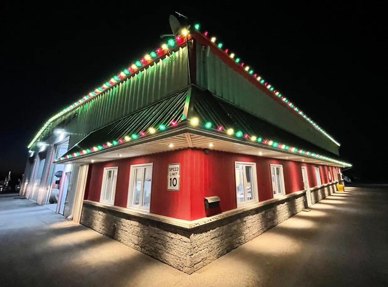 Commercial building decorated with festive Christmas lights