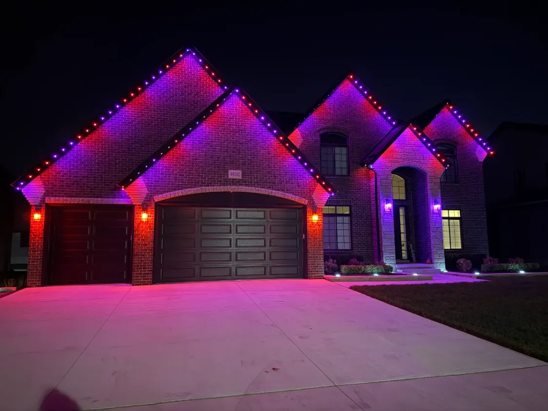Spooky Halloween lighting on a brick house