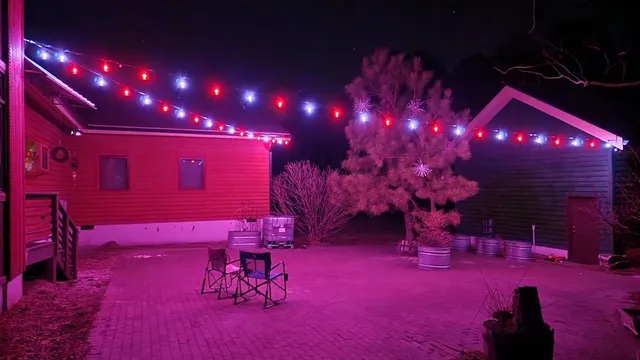 Backyard patio with magenta and red color-changing lights