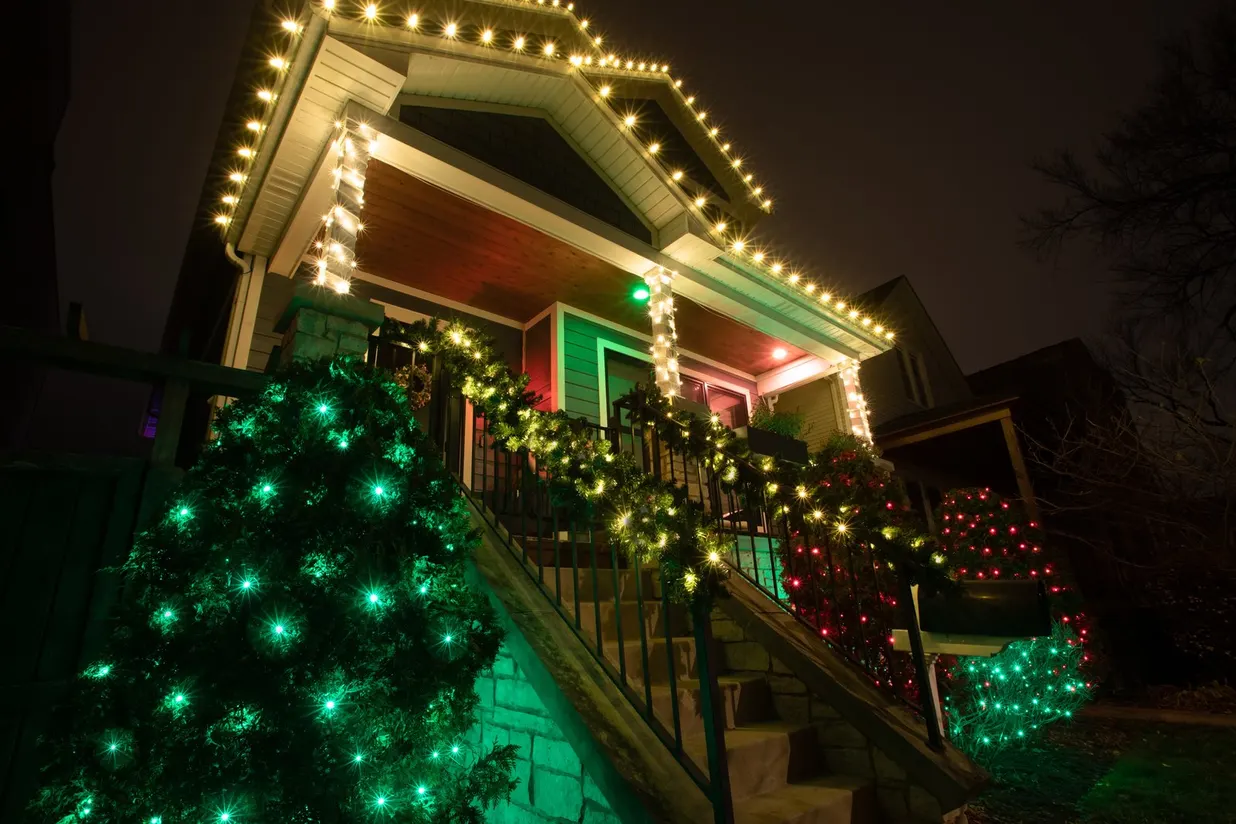 Beautifully lit residential home with Christmas lights