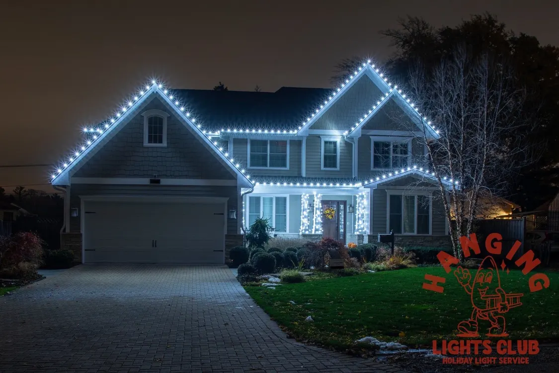 Modern home with cool blue and white LED holiday lights